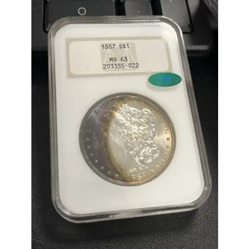1887 S$1 Silver Morgan Dollar NGC MS63 (TONED )