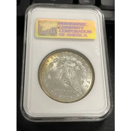 1887 S$1 Silver Morgan Dollar NGC MS63 (TONED )  (2)