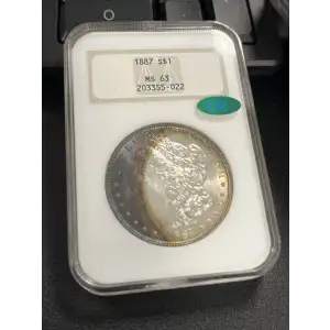 1887 S$1 Silver Morgan Dollar NGC MS63 (TONED )